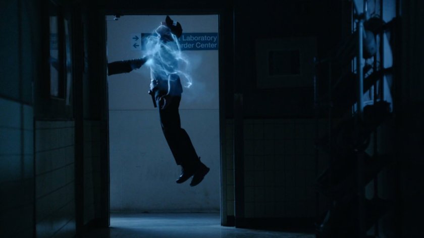 Guard being strangled in hospital hallway.