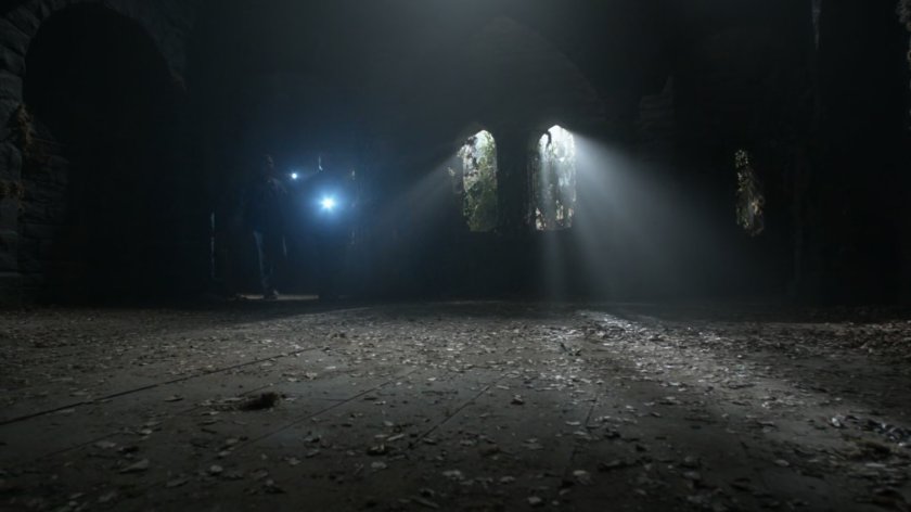 Dark interior of English castle.