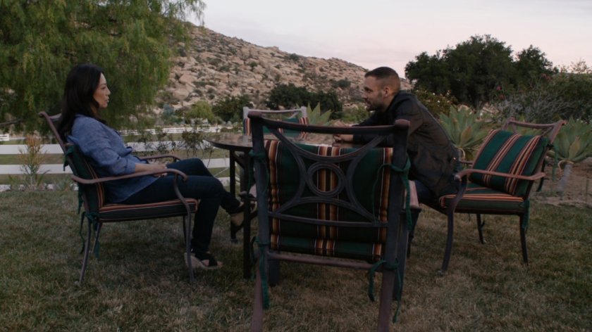 Hunter and May sitting at outdoor table in Arizona.