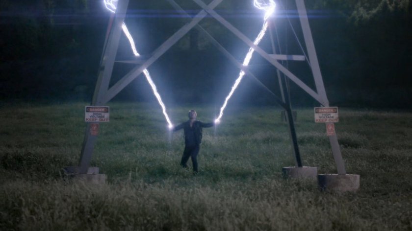 Lightening sparking from Lincoln's hands into power lines.