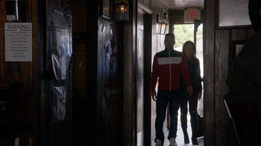 May and Hunter enter Irish Bar from rear.