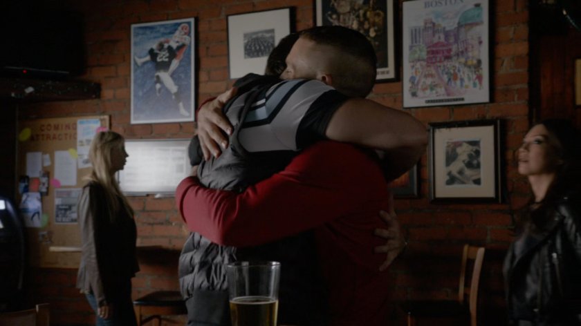 Hunter hugs Spud in Irish Bar.