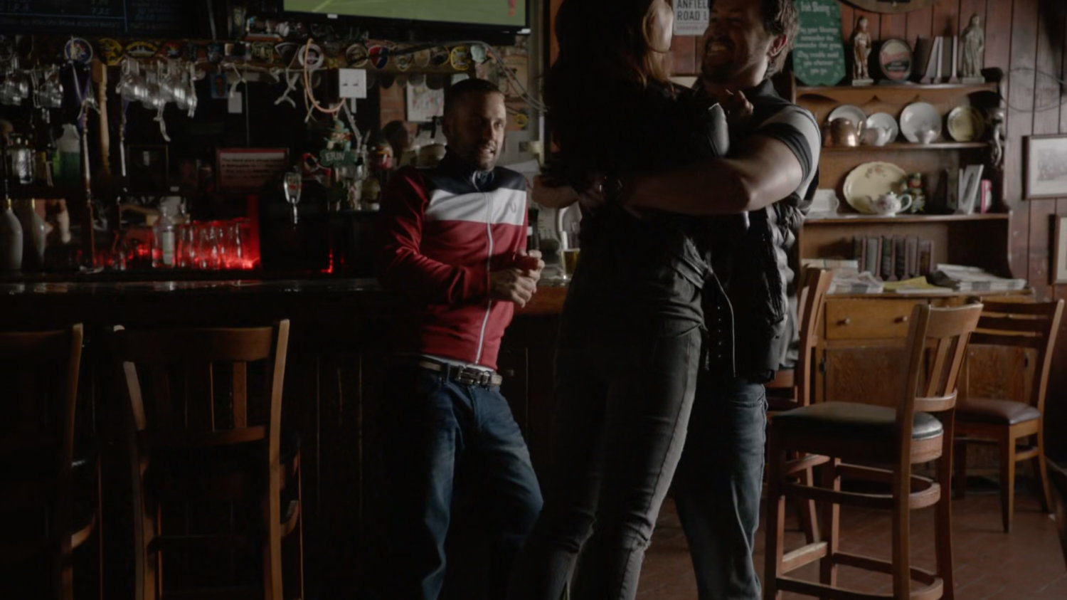 Spud hugs May as Hunter looks on in Irish Bar.