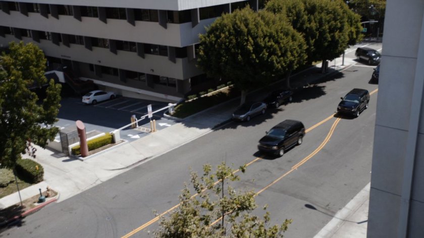 ATCU vehicles pulling up outside Donnelly's apartment.