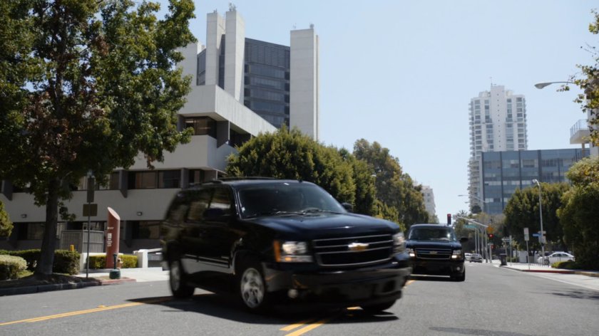 ATCU vehicles pulling up outside Donnelly's apartment.
