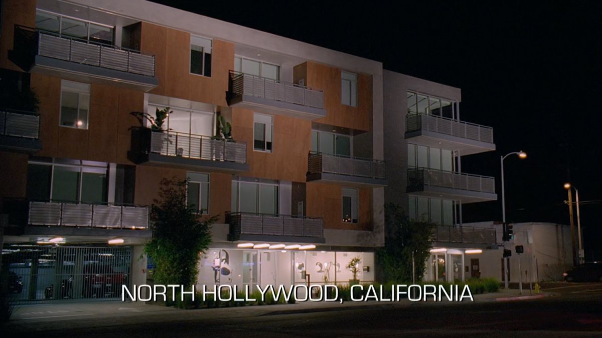 Exterior of apartment complex. Text: North Hollywood, California.