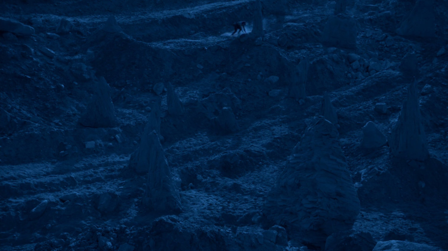 Jemma runs through a series of rocky pinnacles on Maveth/
