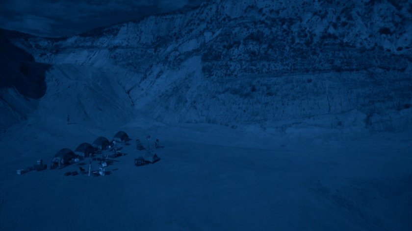 Wide shot of NASA encampment near a mountain on Maveth.