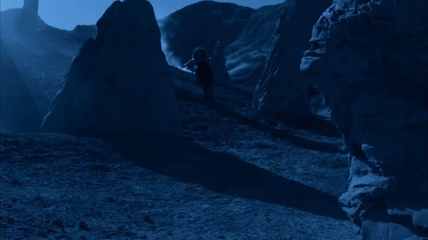 Jemma runs through a series of rocky pinnacles on Maveth.