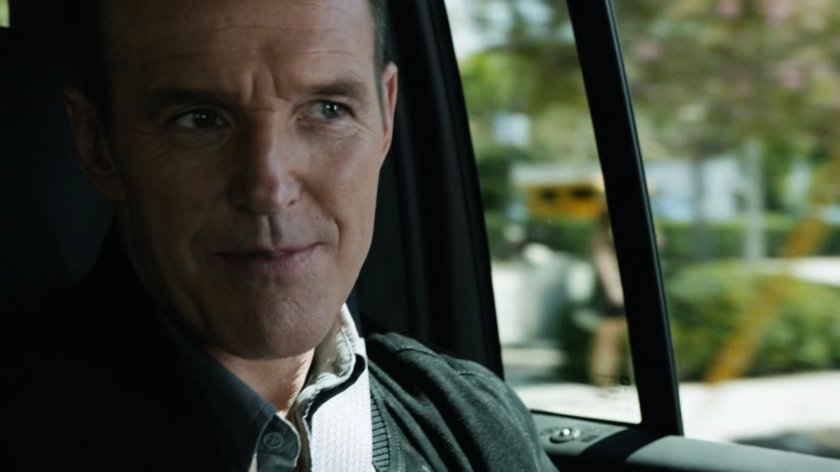 Coulson inside car on Washington DC street.