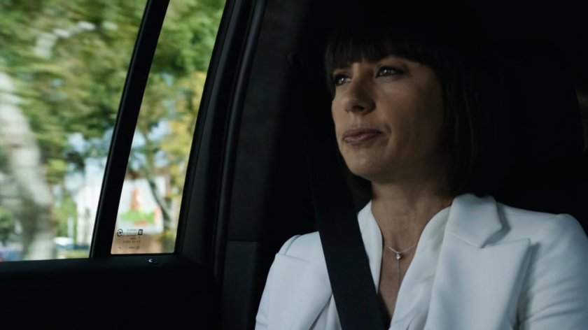 Rosalind inside car on Washington DC street.