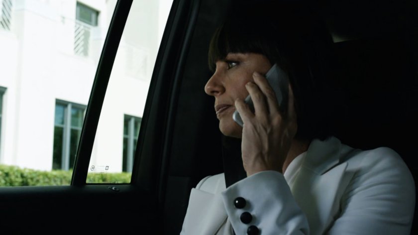 Rosalind inside car on Washington DC street.