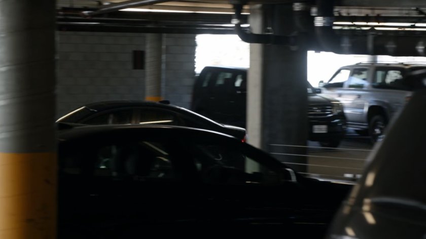Cars in a parking garage.