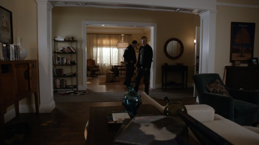 Coulson inside of Rosalind Price's house.