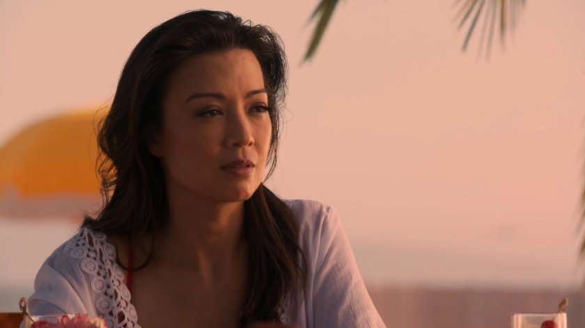 Agent May on Maui beach at Sunset.