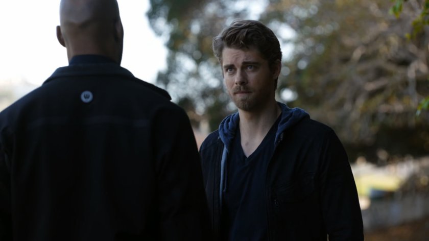 Mack and Lincoln talking at a park.