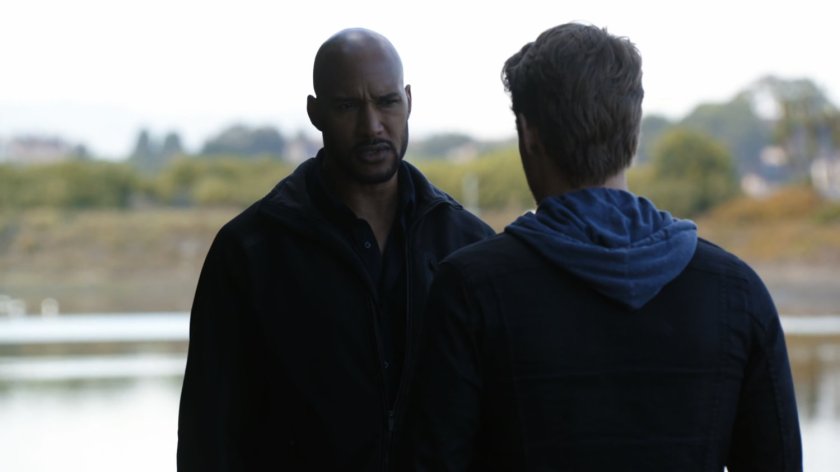 Mack and Lincoln talking at a park.