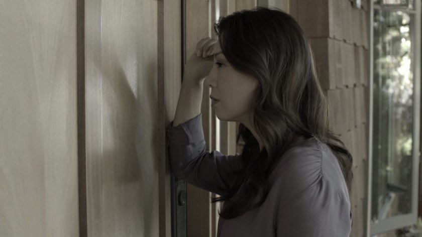 May at the front door to Andrew's house.