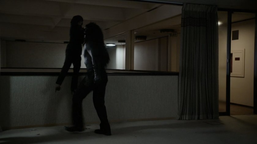 Lash holding Rosalind by her neck in Culver University Old Administration Building.