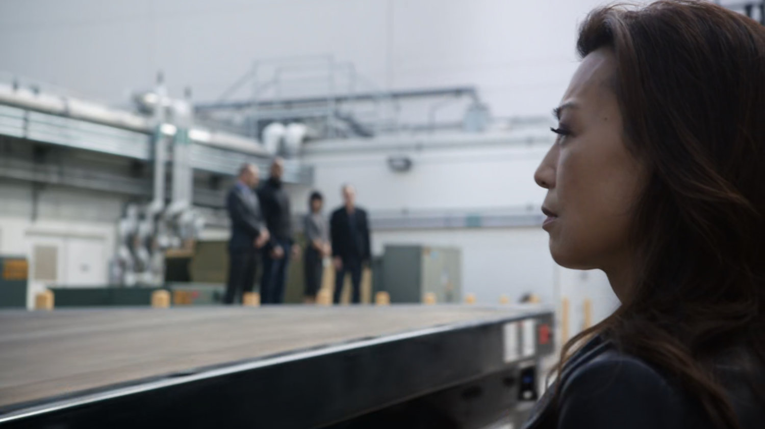 May watching truck drive away outside a loading dock in Maryland.