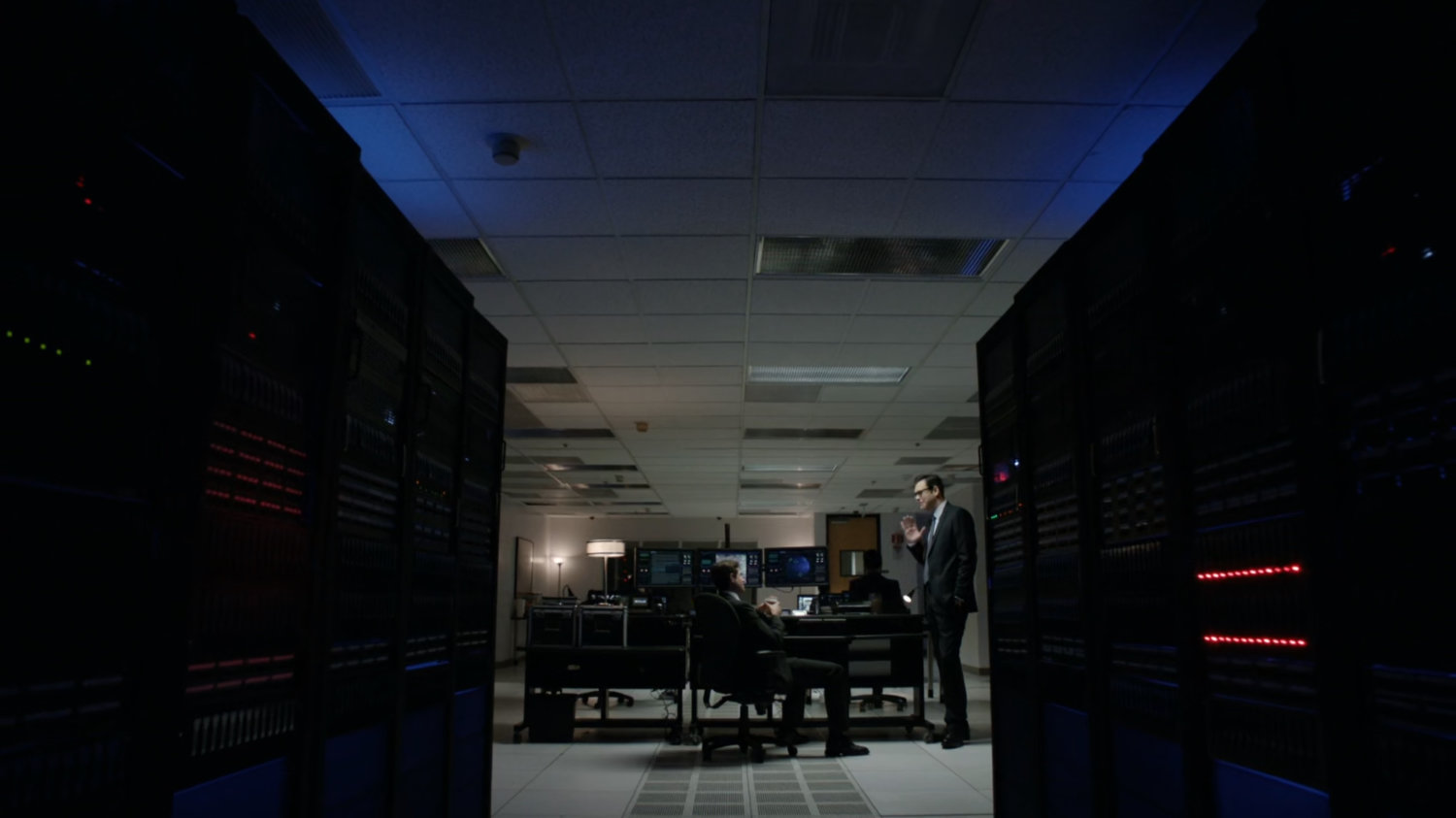 Men in the computer room of the ATCU.
