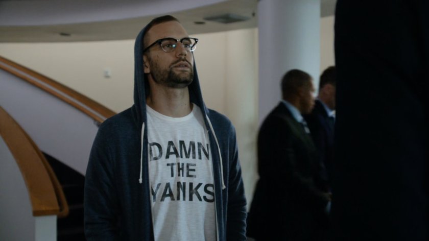 Hunter in the ATCU lobby wearing a "Damn the Yanks" t-shirt.