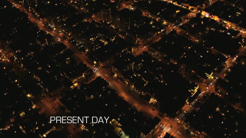 Nighttime aerial of Bogota, Colombia. Text: Present Day.