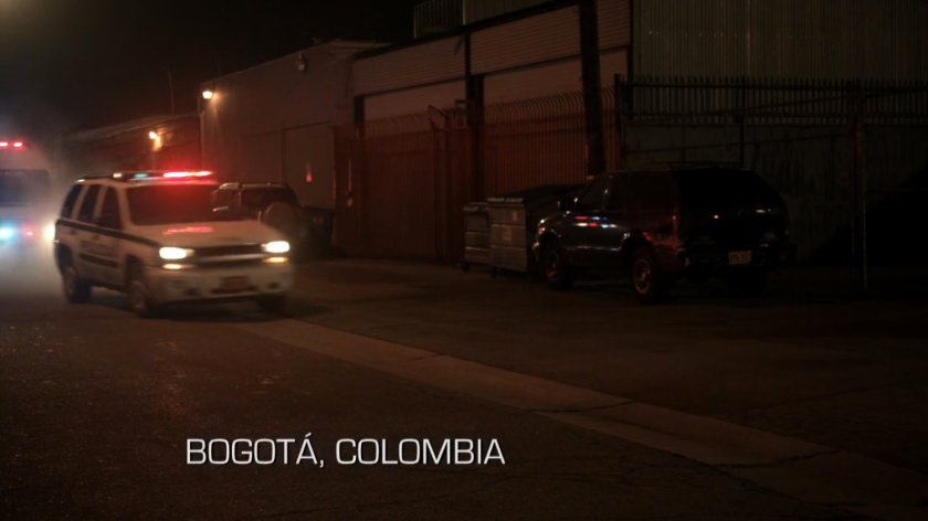 Police car on a Bogota street. Text: Bogata, Colombia.