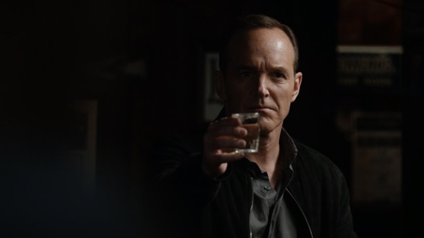 Coulson toasts Hunter and Bobbi inside Teddy's Bar.