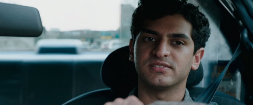 Dopinder driving a taxi cab.