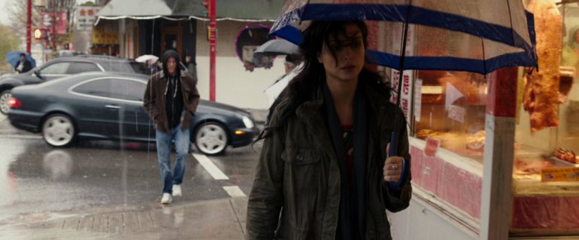 Wade following Vanessa along a sidewalk.