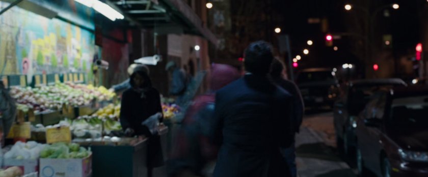 Deadpool tackling Man on Chinatown sidewalk.