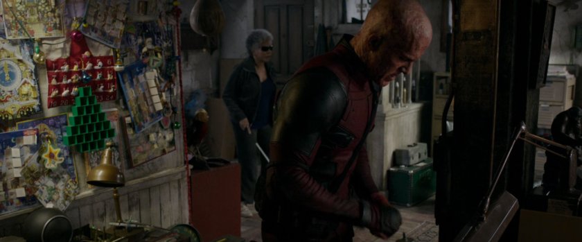 Wade and Blind Al in their apartment.