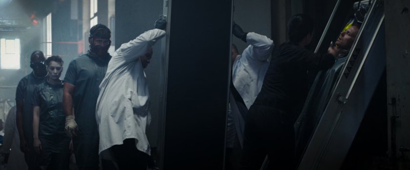 Doctors and patients in patients in Ajax's secret lab.