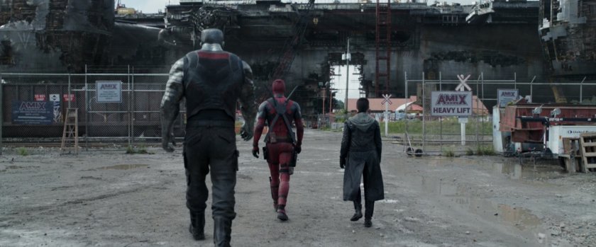 Colossus, Deadpool, and Negasonic Teenage Warhead entering scrap yard.