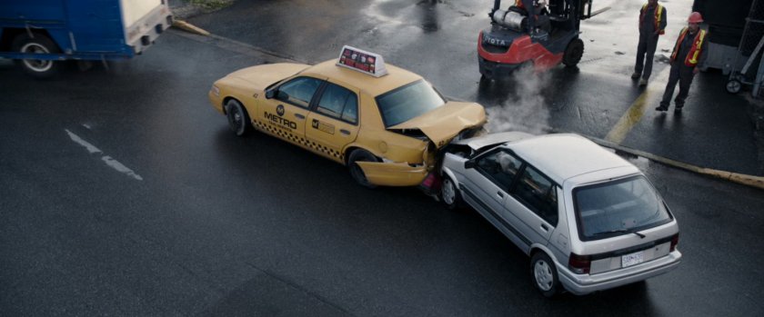 Car rear end a taxi cab.