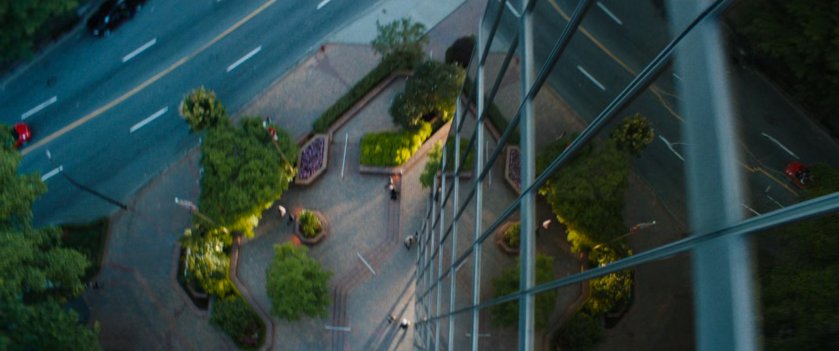 View of street and courtyard during fall from high rise.