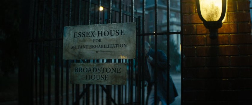 Sign on fence: Text: Essex House for Mutant Rehabilitation. Broadstone House.