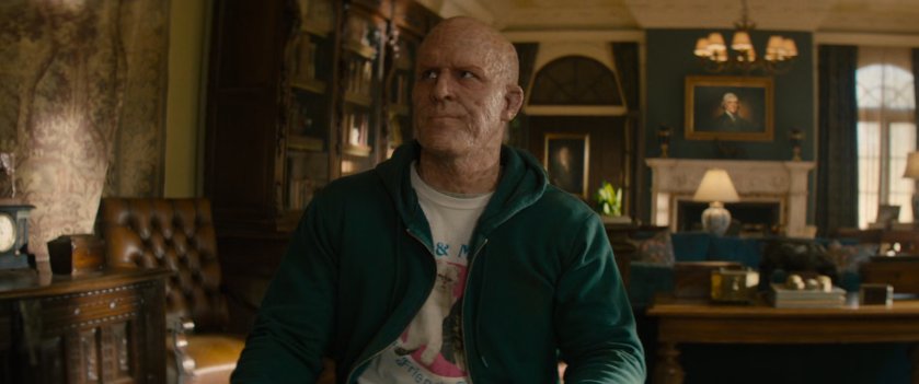 Wade riding through the X-Mansion on a motorized wheelchair.