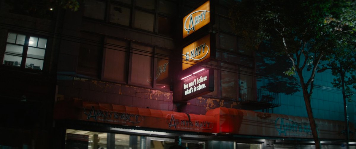 Exterior of Army & Navy store with signage.