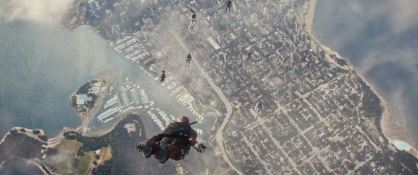 Deadpool and X-Force skydiving with city below them.