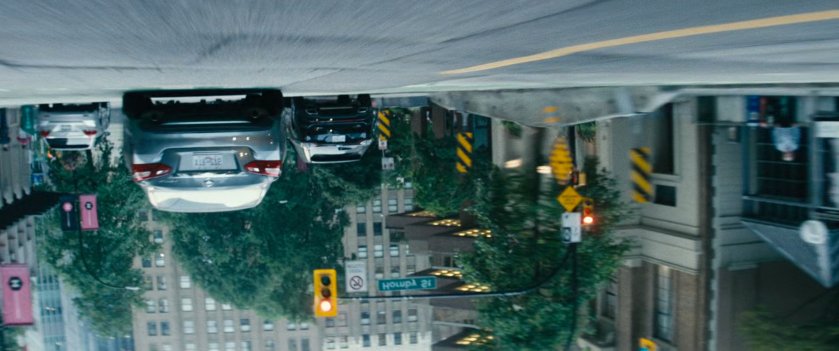 A POV from Deadpool of an upside down city street.