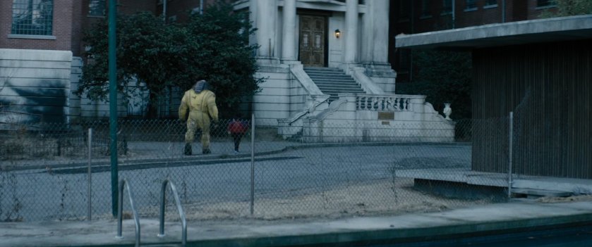 Juggernaut and Russell walking towards Essex House entrance.