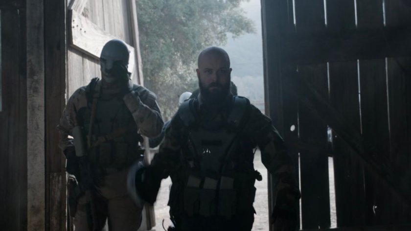 Watchdog members entering old barn.