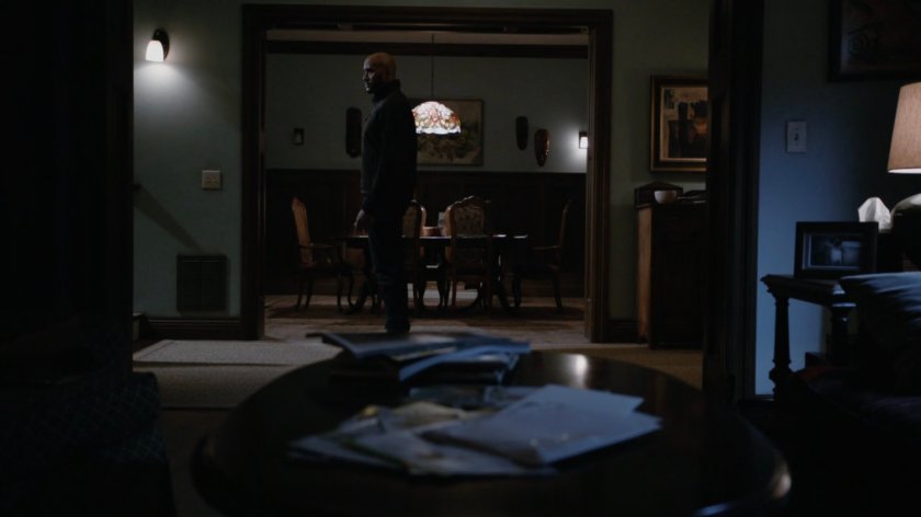 Mack standing in his front hallway.