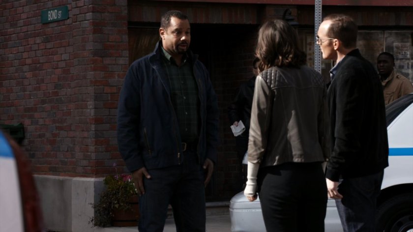 Coulson and Daisy talk to shop owner in Dyker Heights.