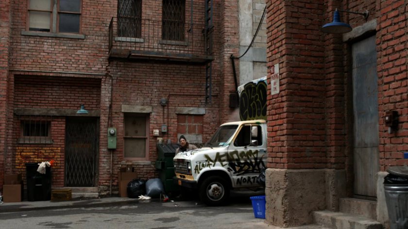 Homeless man Charles in Dyker Heights alley.