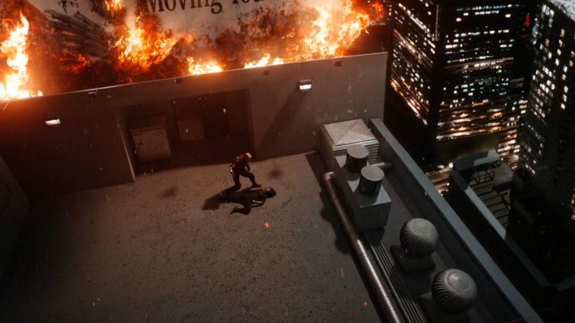 Malick stands over Daisy on rooftop of Transia Corporation.