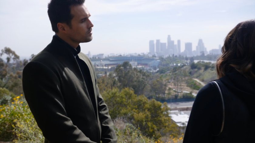 Hive and Daisy on hill overlooking downtown Los Angeles.