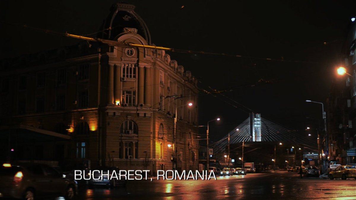 Night shot of Bucharest street. Text: Bucharest, Romania.